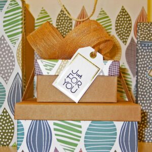 Close-up Photo of Gift Boxes with Greeting Card